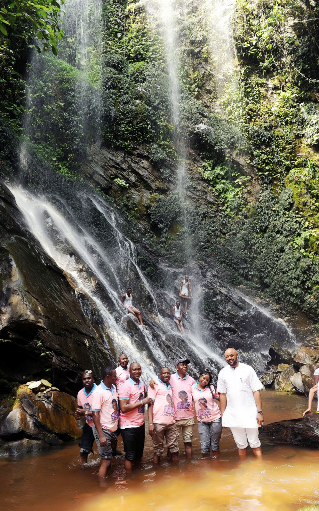 Visitors gathered at the foot of one of the Olumirin cascades
